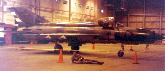 Chris lounges near MiG-21